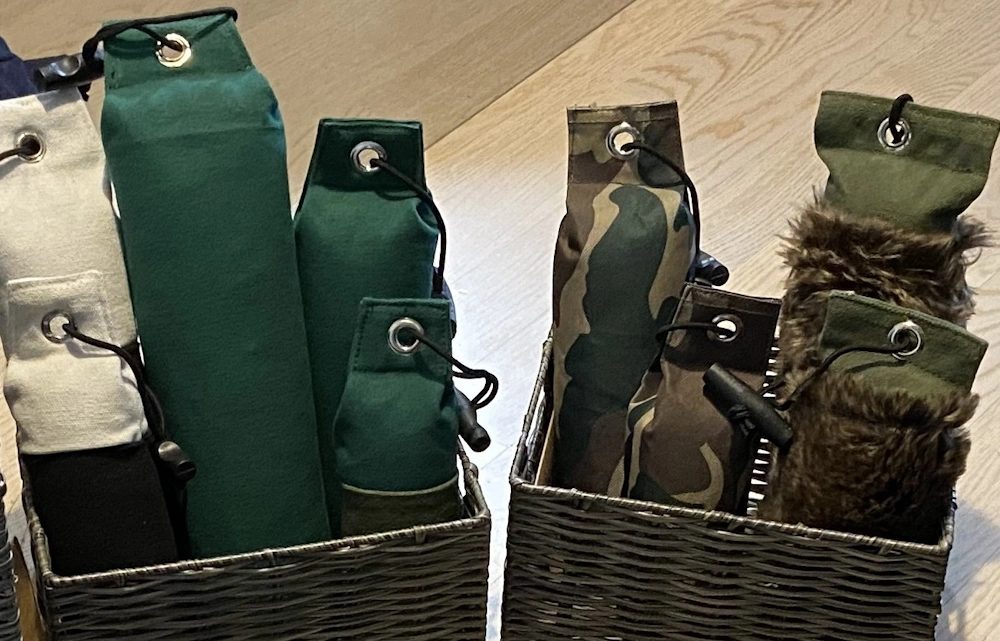 Grüner Dummy und Tarnung in verschiedenen Größen und Gewichten